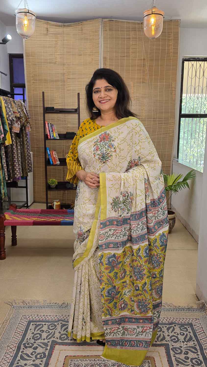 Hand block printed Cream & multicolor saree