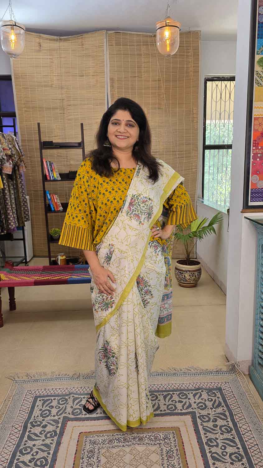 Hand block printed Cream & multicolor saree